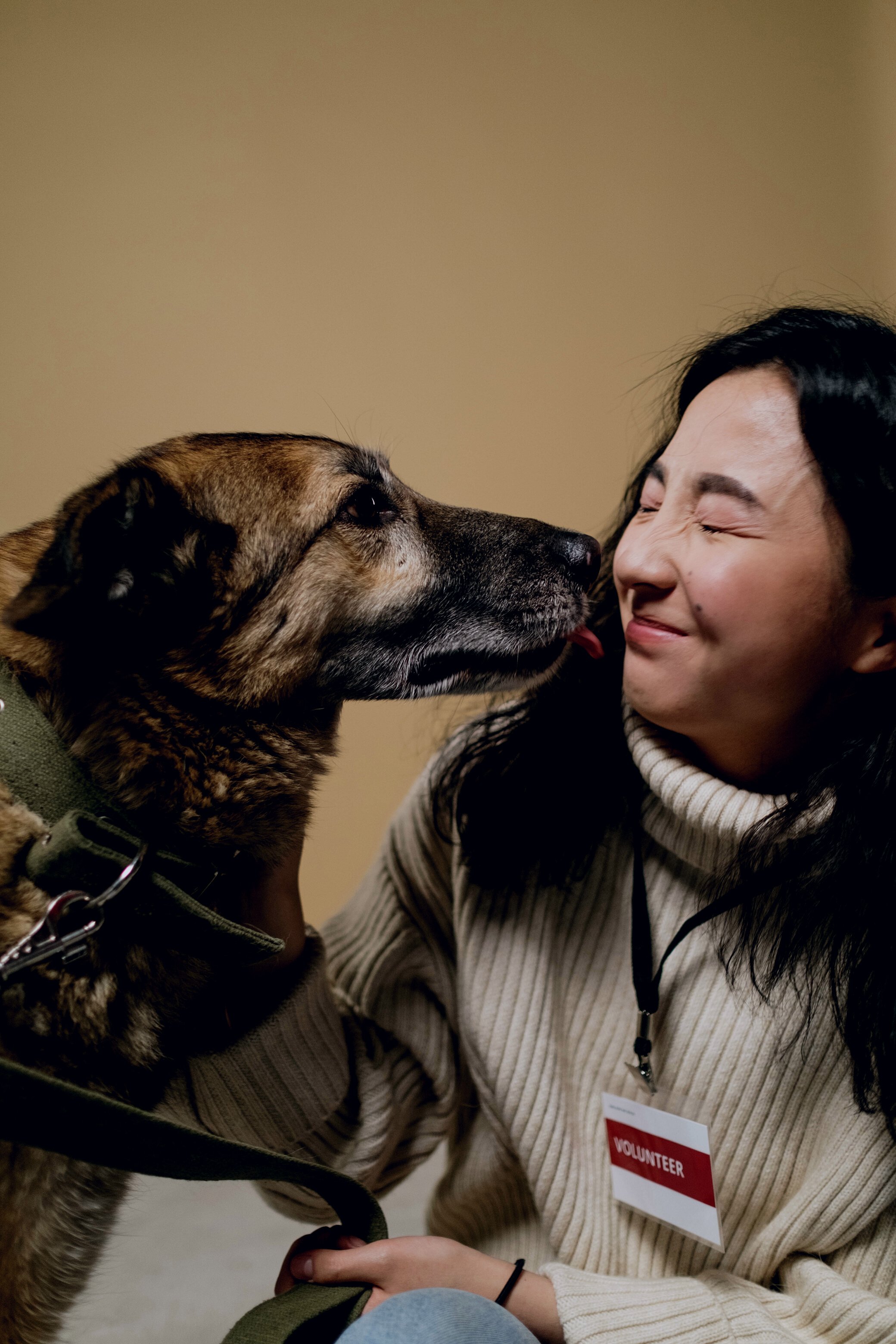 A Woman Playing with Her Dog